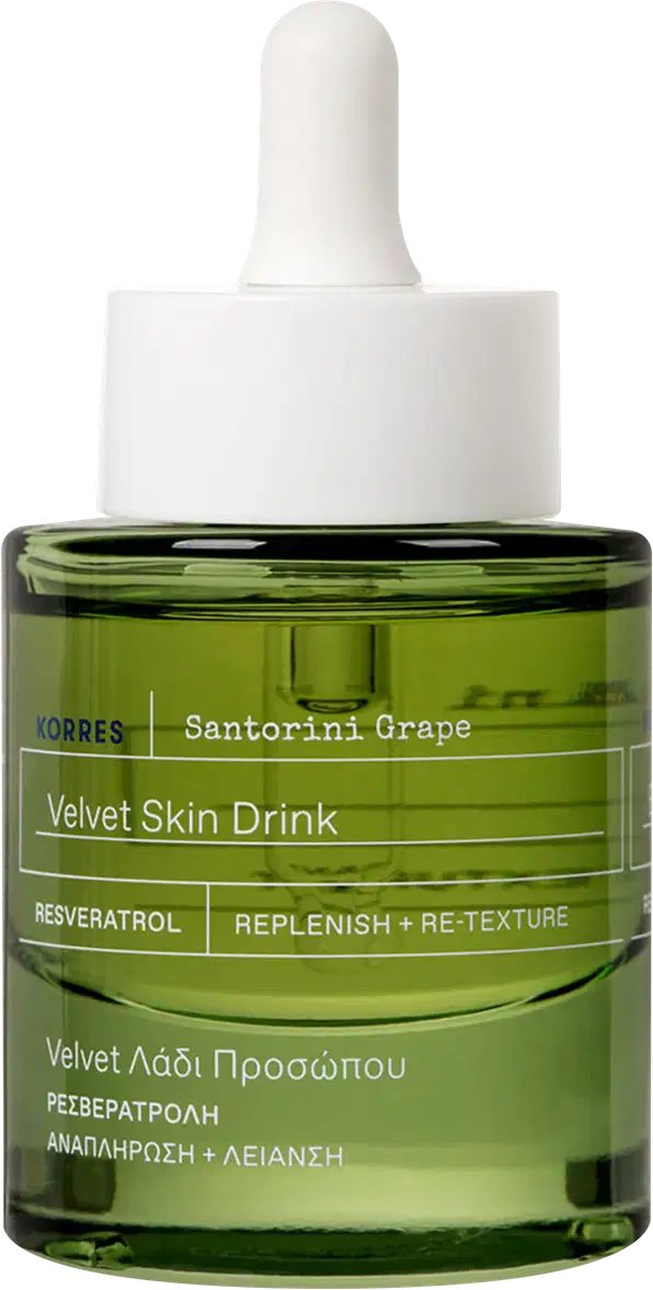 Frasco de vidro verde com conta-gotas branco contendo um soro facial da marca Korres, com rótulo indicando "Velvet Skin Drink" e ingredientes como Resveratrol e Santorini Grape.
