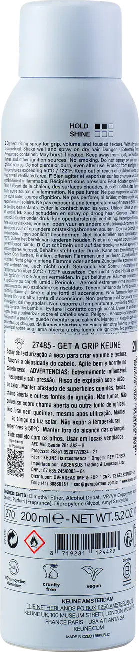 A imagem mostra a parte de trás do produto Get a Grip com texto em várias línguas, incluindo instruções de uso, ingredientes e informações da empresa. Símbolos indicando que é vegano, livre de crueldade e reciclável.