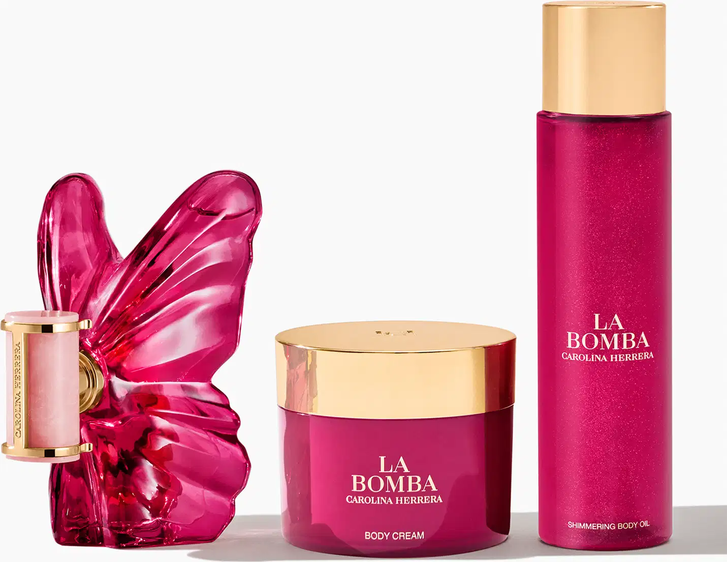 Frasco de perfume Carolina Herrera em formato de borboleta, com embalagem de vidro rosa intenso e detalhes dourados no rótulo.