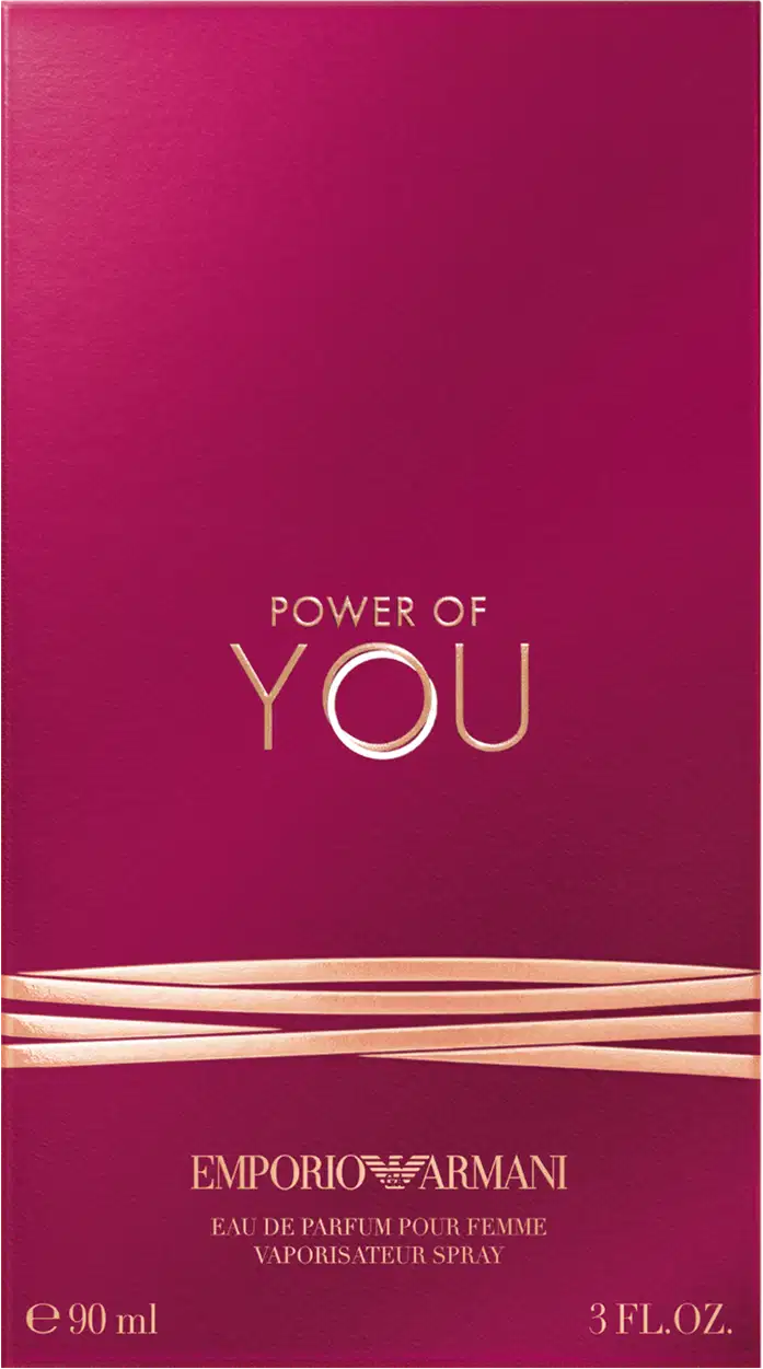 Caixa Power of You Armani Eau de Parfum exibe o texto "POWER OF YOU" em letras douradas sobre fundo rosa vibrante. O design é elegante e minimalista, com uma aparência sofisticada.