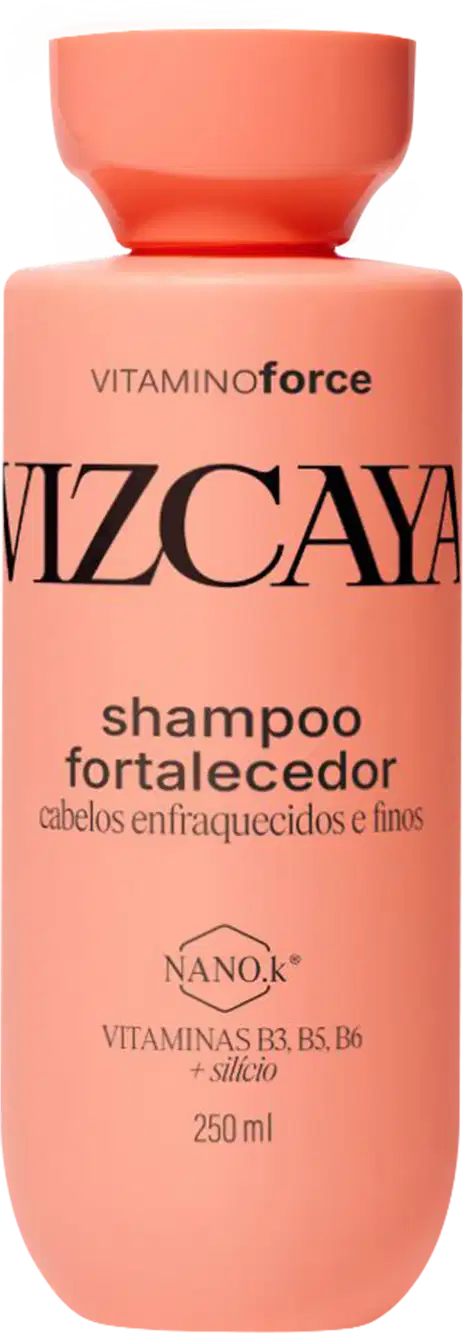 Frasco de shampoo Vizcaya Fortalecedor, com embalagem de cor coral predominante, contendo informações sobre os ingredientes vitamínicos e o benefício de cabelos enfraquecidos e finos.