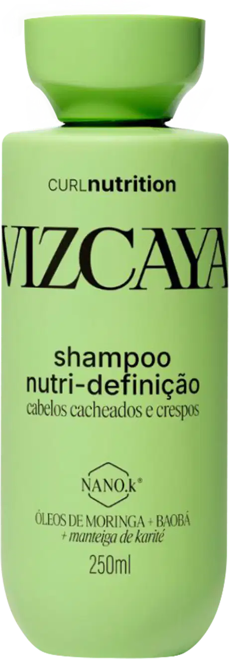 Frasco verde de shampoo Vizcaya Curl Nutrition com rótulo destacando "Nutri-definição" para cabelos cacheados e crespos, contendo óleos de moringa e baobá, além de manteiga de karité.