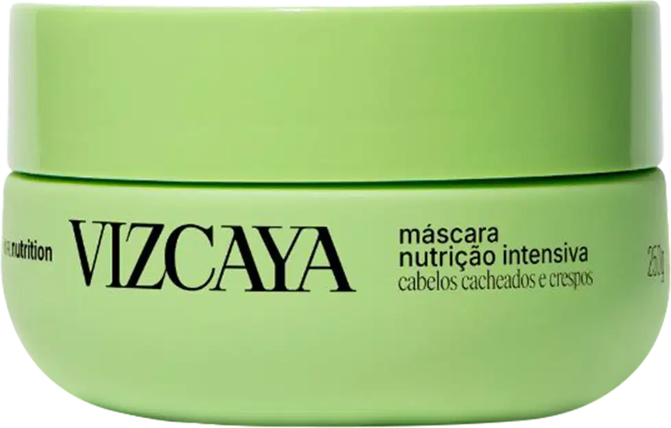 Embalagem verde-clara em formato de pote contendo a inscrição "VIZCAYA" e "máscara nutrição intensiva" em preto. O produto é destinado a cabelos cacheados e crespos.