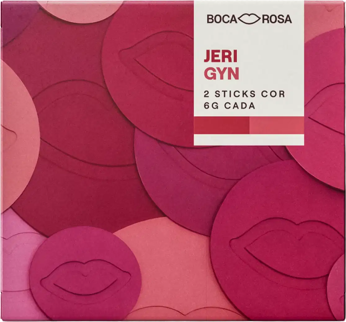 Embalagem Boca Rosa Jeri Gyn com 2 sticks cor rosa e vinho, 6g cada, com design de lábios em relevo e tons degradê de rosa.