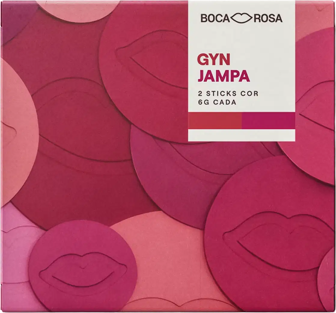 Caixa de Gyn Jampa Boca Rosa com 2 sticks cor de 6g cada, embalagem rosa com padrão de lábios em tons de rosa e magenta.