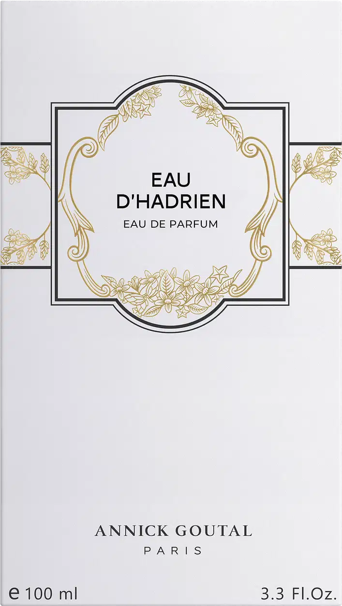 Eau de Parfum Eau d'Hadrien da Annick Goutal Paris em embalagem branca com ornamentos dourados. Frasco de 100ml (3.3 FL.Oz). Design elegante com moldura decorativa e detalhes florais em ouro.
