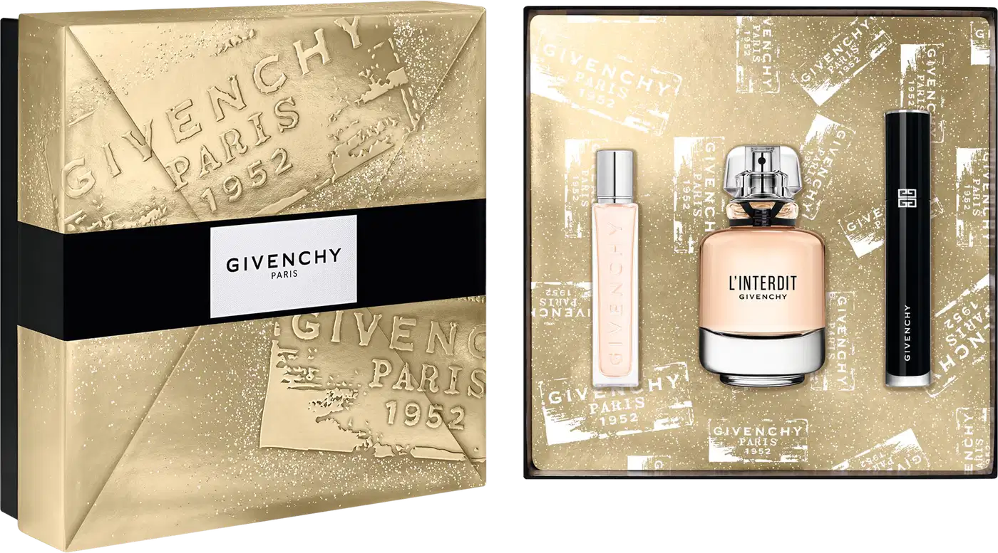 Conjunto Givenchy com caixa dourada texturizada contendo frasco de item de perfumaria L'Interdit, frasco rosa claro e máscara de cílios preta.