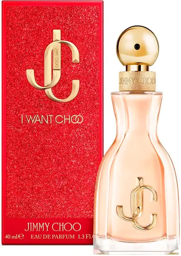 Frasco de item de perfumaria da marca Jimmy Choo, com formato arredondado e tampa dourada, embalado em caixa vermelha brilhante com logotipo dourado.
