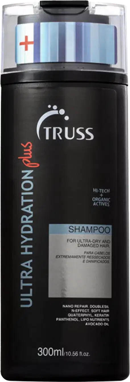 Frasco preto de shampoo da marca Truss, com rótulo em branco e vermelho. O produto é descrito como indicado para cabelos extremamente ressecados e danificados, contendo ativos orgânicos de alta tecnologia.