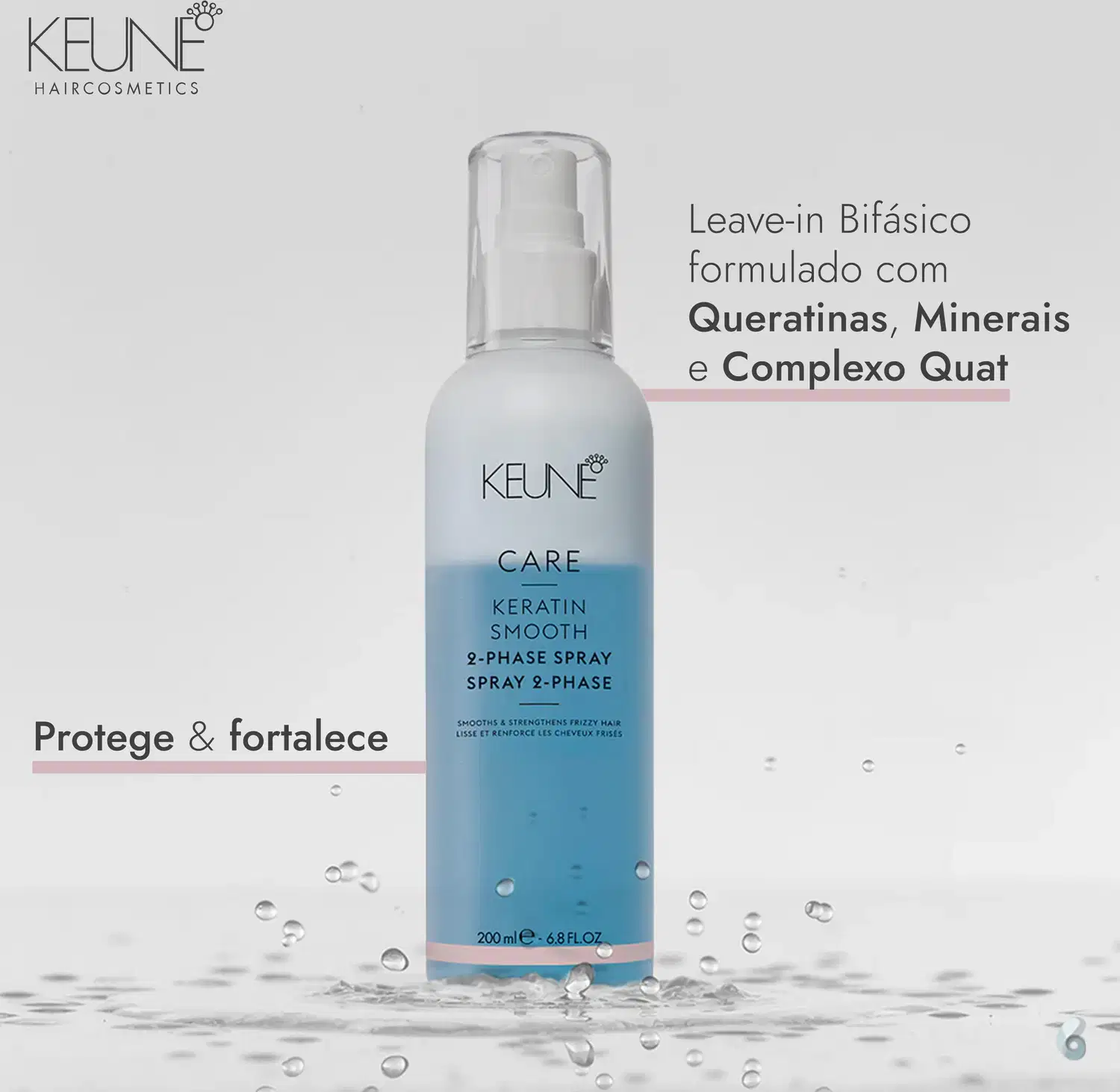 Frasco de spray bifásico da linha Keratin Smooth da Keune, contendo fórmula com queratina, minerais e complexo Quat, para proteger e fortalecer os cabelos.