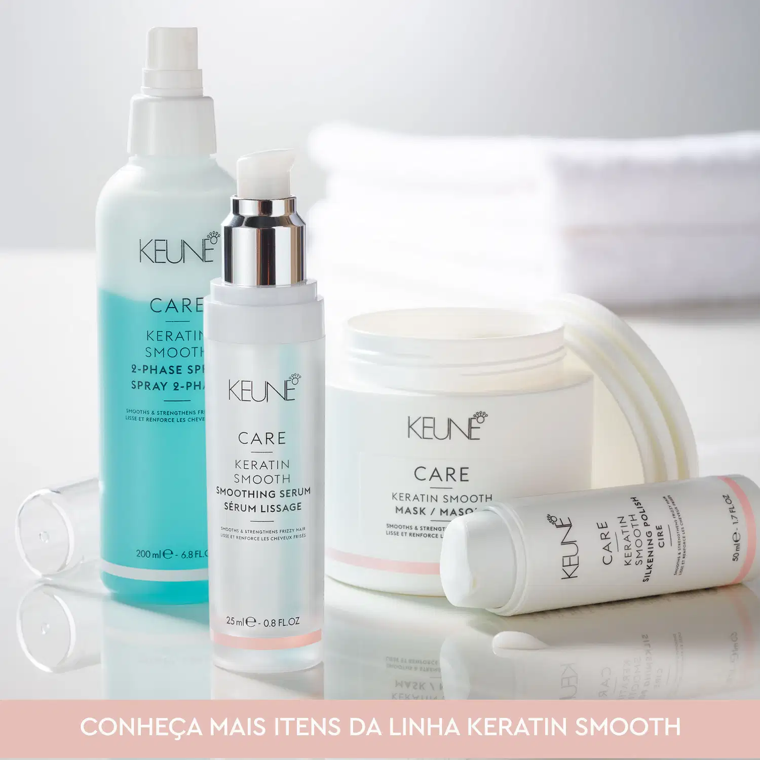 Produtos da linha Keratin Smooth da marca Keune, incluindo spray, sérum e máscara, dispostos em um ambiente claro e minimalista, destacando os benefícios do tratamento de alisamento com queratina.