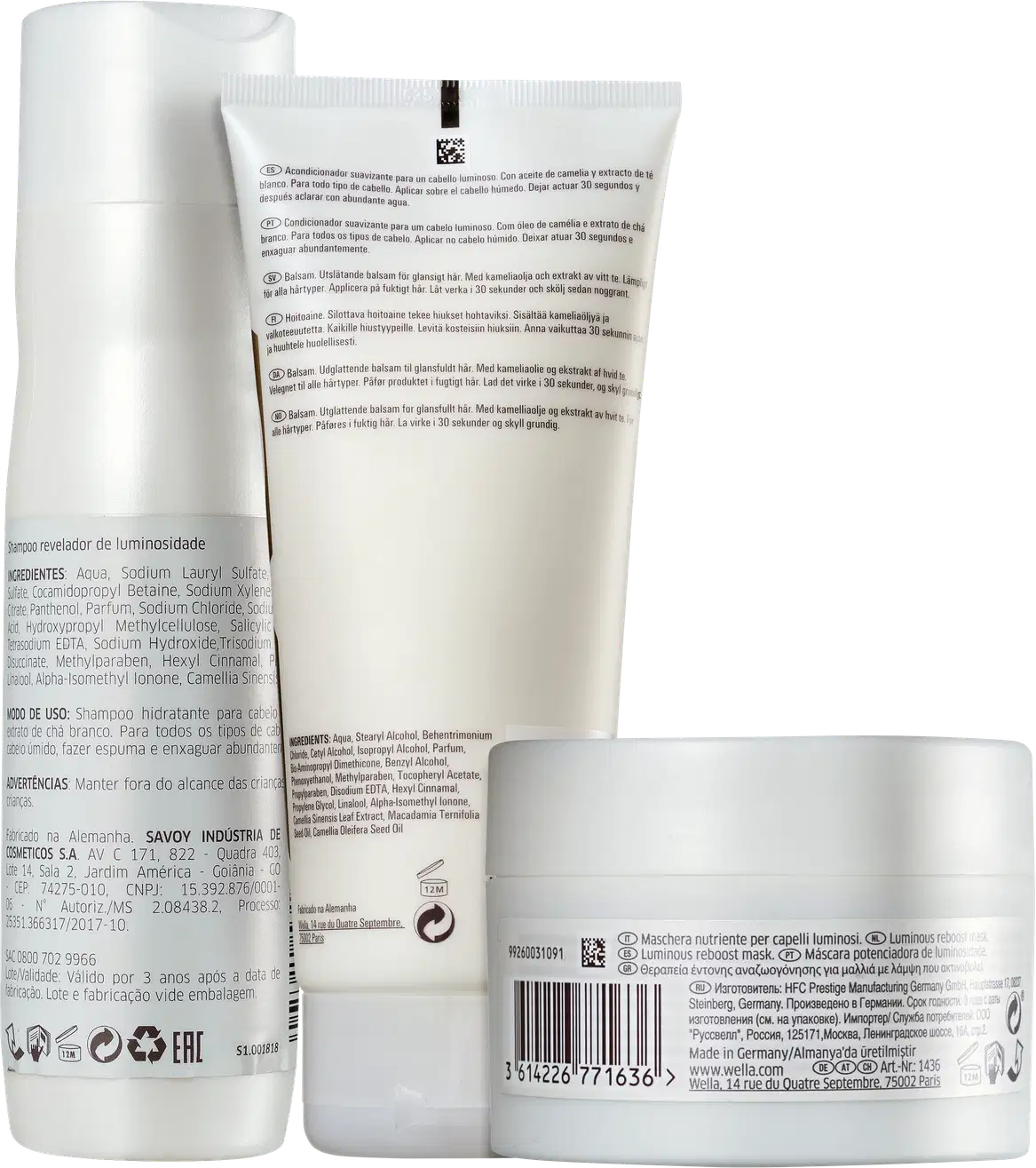 Produtos da linha Oil Reflections da Wella Professionals, incluindo shampoo, condicionador e máscara, em embalagens brancas com detalhes dourados, exibindo o logotipo da marca.