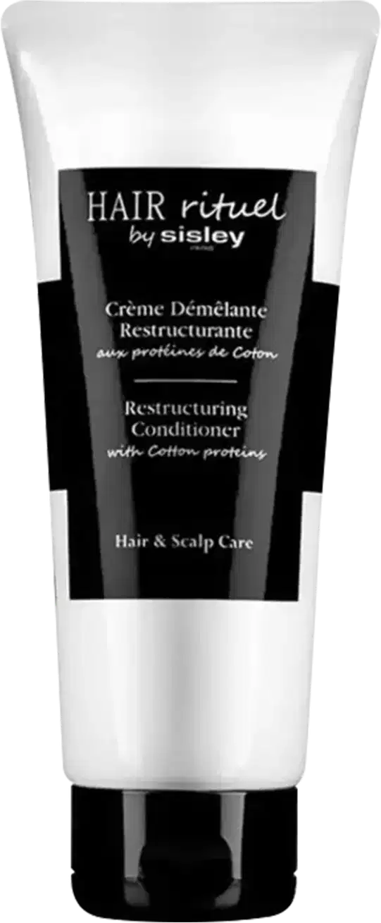 Condicionador da marca Sisley, chamado "Hair rituel". O rótulo indica que se trata de um condicionador reestruturante com proteínas de algodão. O produto é apresentado em um tubo plástico com tampa.