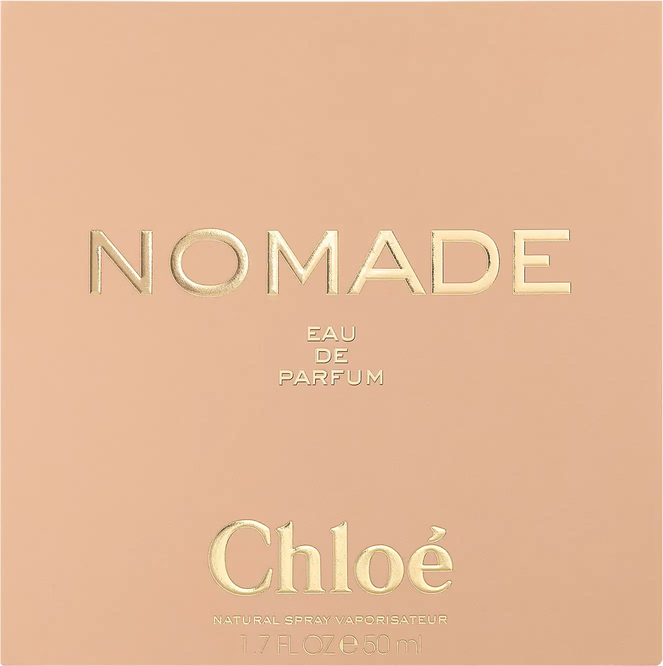 Caixa retangular em tons de bege e rosa claro. O nome "Nomade" está escrito em letras maiúsculas douradas, com a descrição "Eau de Parfum" abaixo em letras menores.