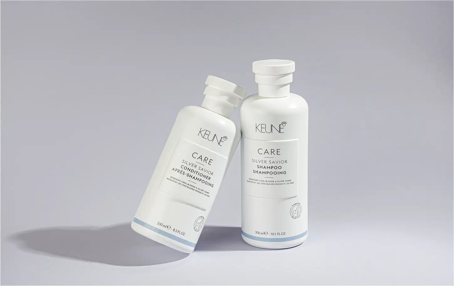 Frasco branco de 300 ml do shampoo Silver Savior da linha Care da Keune, que promete refrescar e tonalizar cabelos loiros e grisalhos.