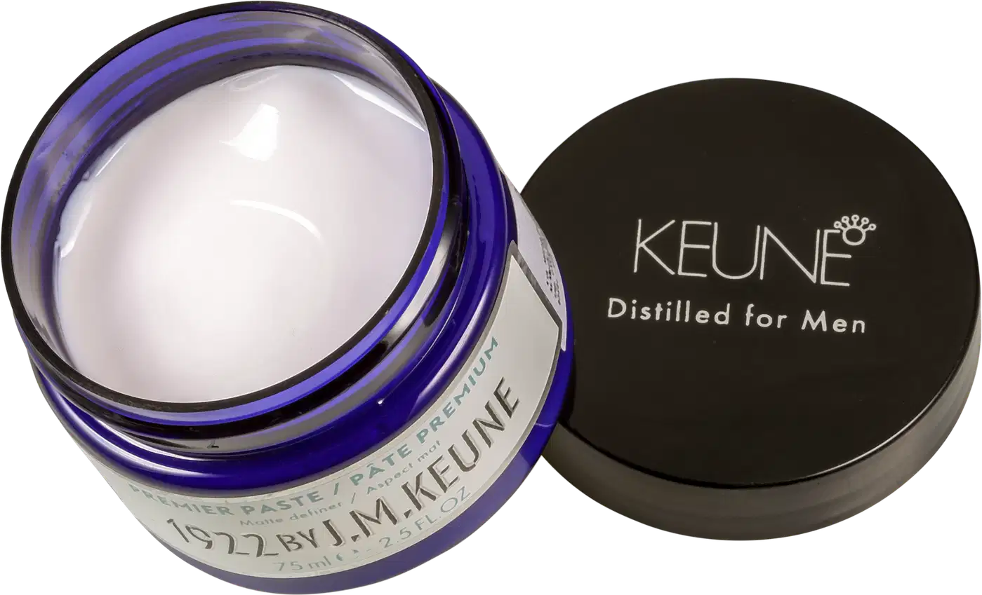 Frasco de creme para cabelos da marca Keune, com embalagem azul e preta, contendo 75ml do produto "Distilled for Men". O rótulo apresenta o nome da marca em destaque.