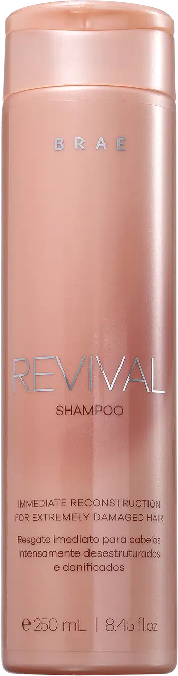 Frasco rosa de shampoo da marca Braé, chamado "Revival", com informações sobre reconstrução imediata para cabelos extremamente danificados.