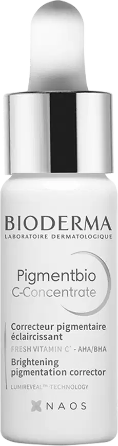 Frasco de vidro branco com conta-gotas da linha Pigmentbio da Bioderma, contendo um concentrado para correção de pigmentação. Rótulo com texto em inglês e francês indicando o nome do produto e sua função de clareamento.