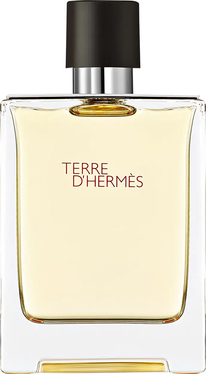 Frasco de perfume Terre d'Hermès com design elegante e minimalista em vidro transparente. Rótulo com texto em vermelho destaca o nome da fragrância.