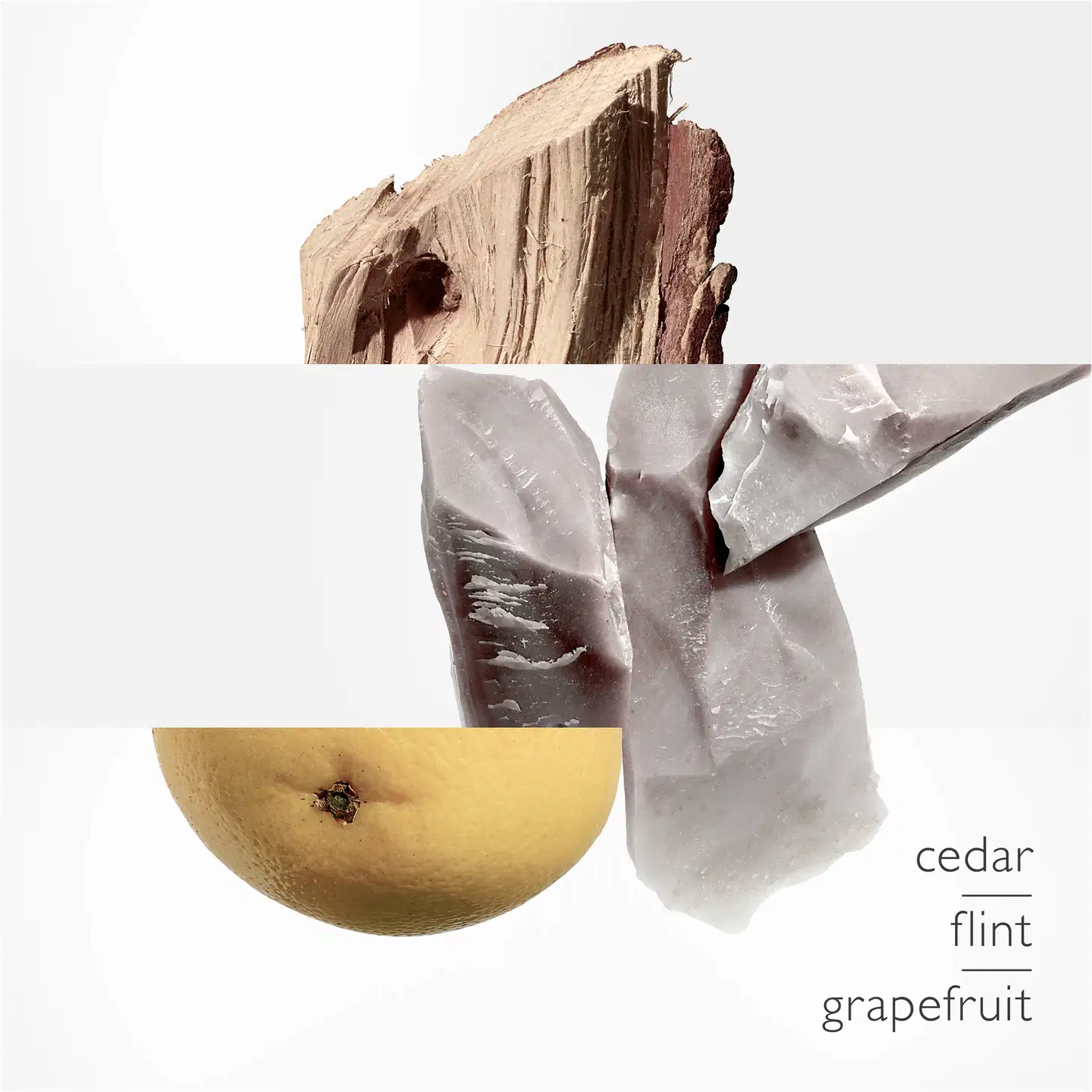 Ambiente natural com elementos rústicos e orgânicos, como madeira, pedra e frutas cítricas, sugerindo uma conexão com a natureza e uma abordagem minimalista e sofisticada da marca Hermès.