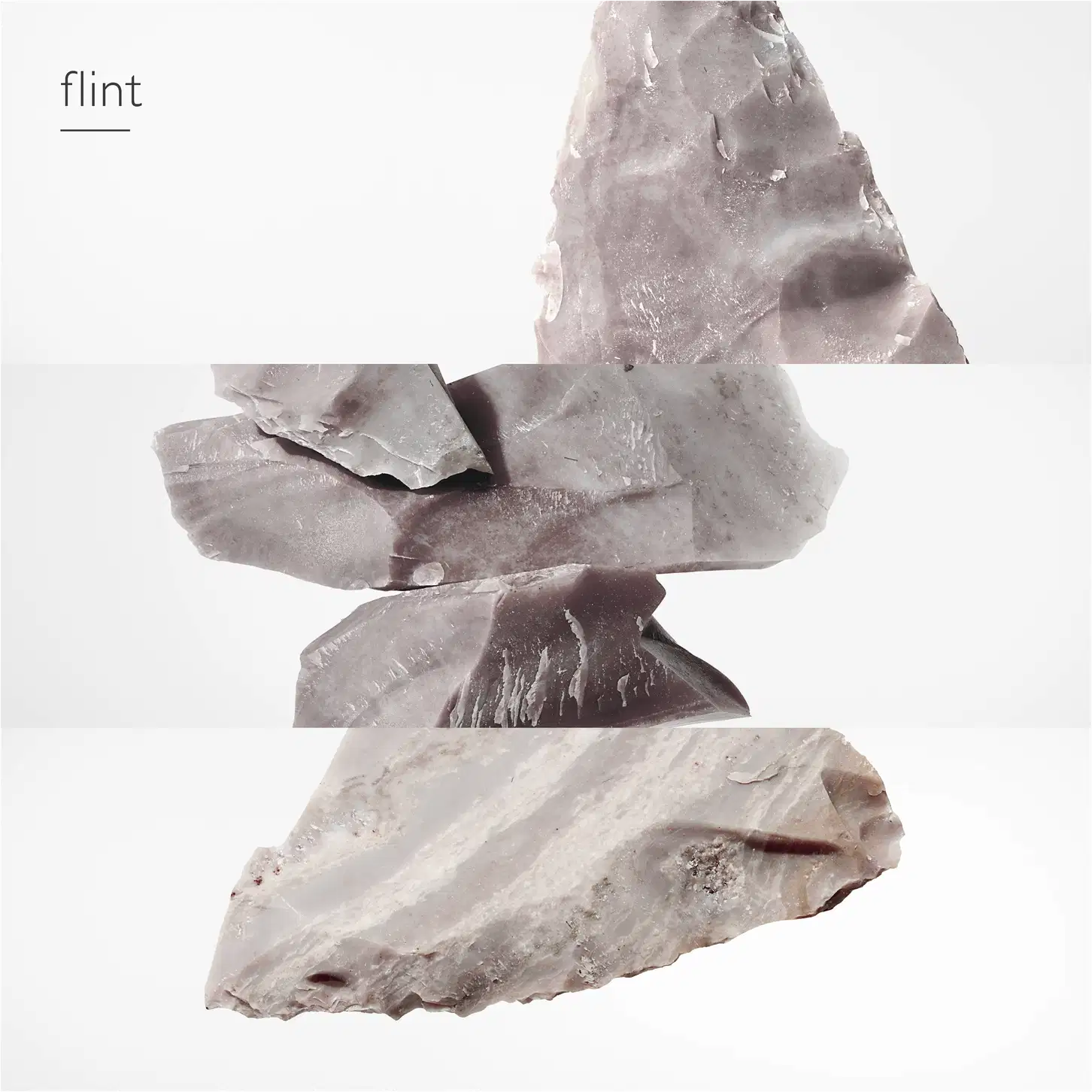 A imagem apresenta fragmentos de um mineral natural, provavelmente em tons de cinza e branco.