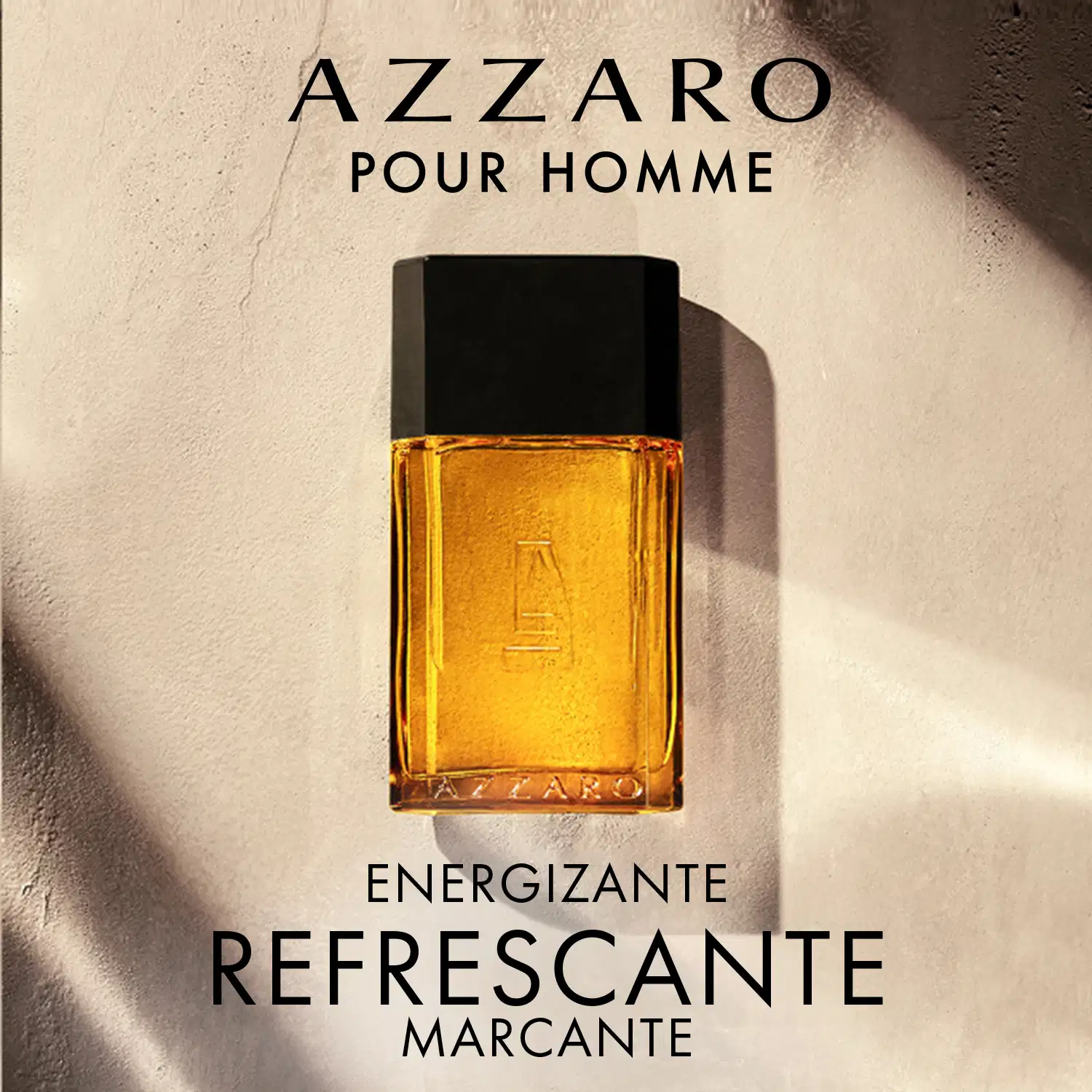 Frasco de perfume Azzaro com design geométrico em preto e amarelo, contendo líquido âmbar. Rótulo com logotipo da marca em destaque.