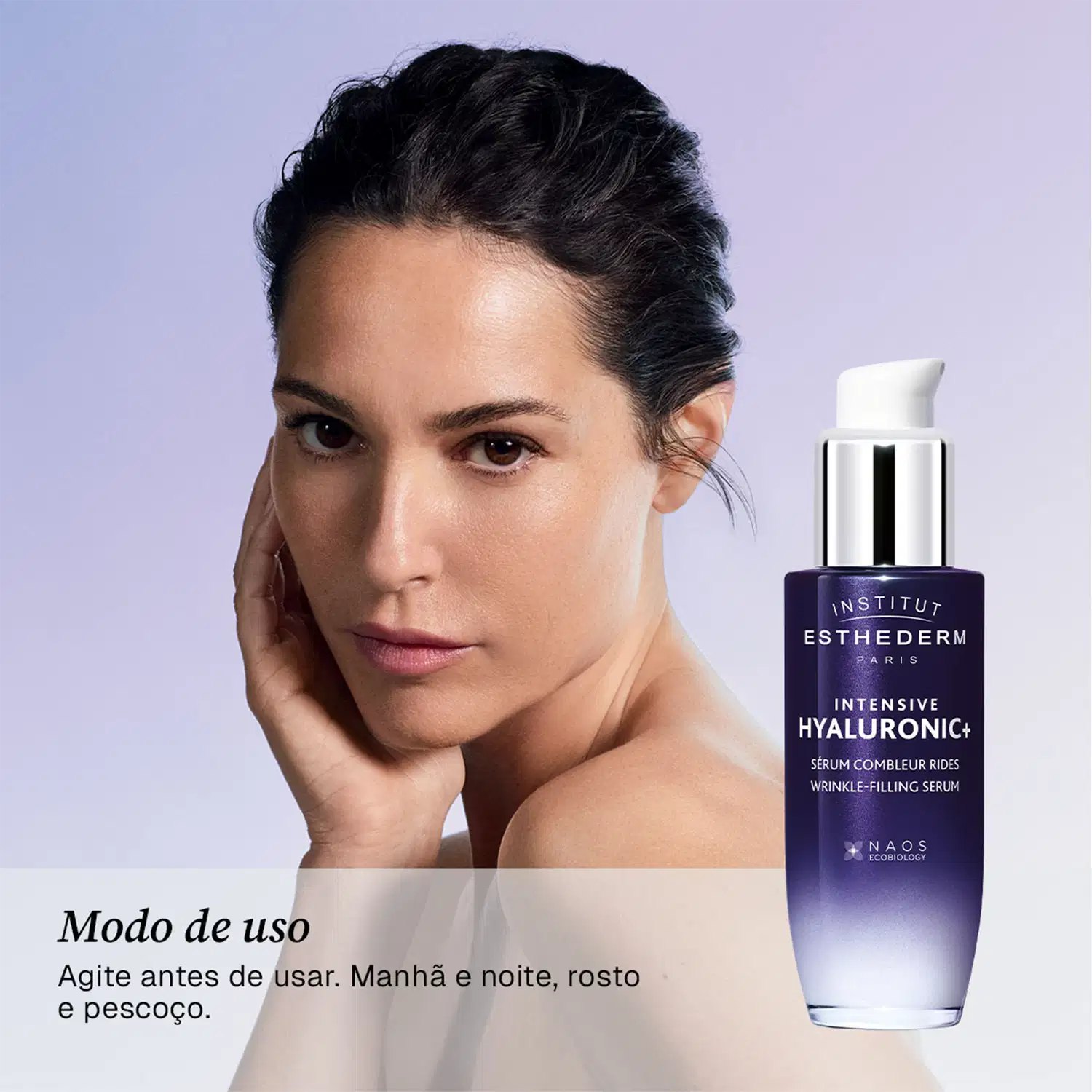 Mulher com cabelos escuros olhando diretamente para a câmera, ao lado de um frasco de soro facial da marca Institut Esthederm com rótulo "Intensive Hyaluronic+ Sérum Combleur Rides Wrinkle-Filling Serum".
