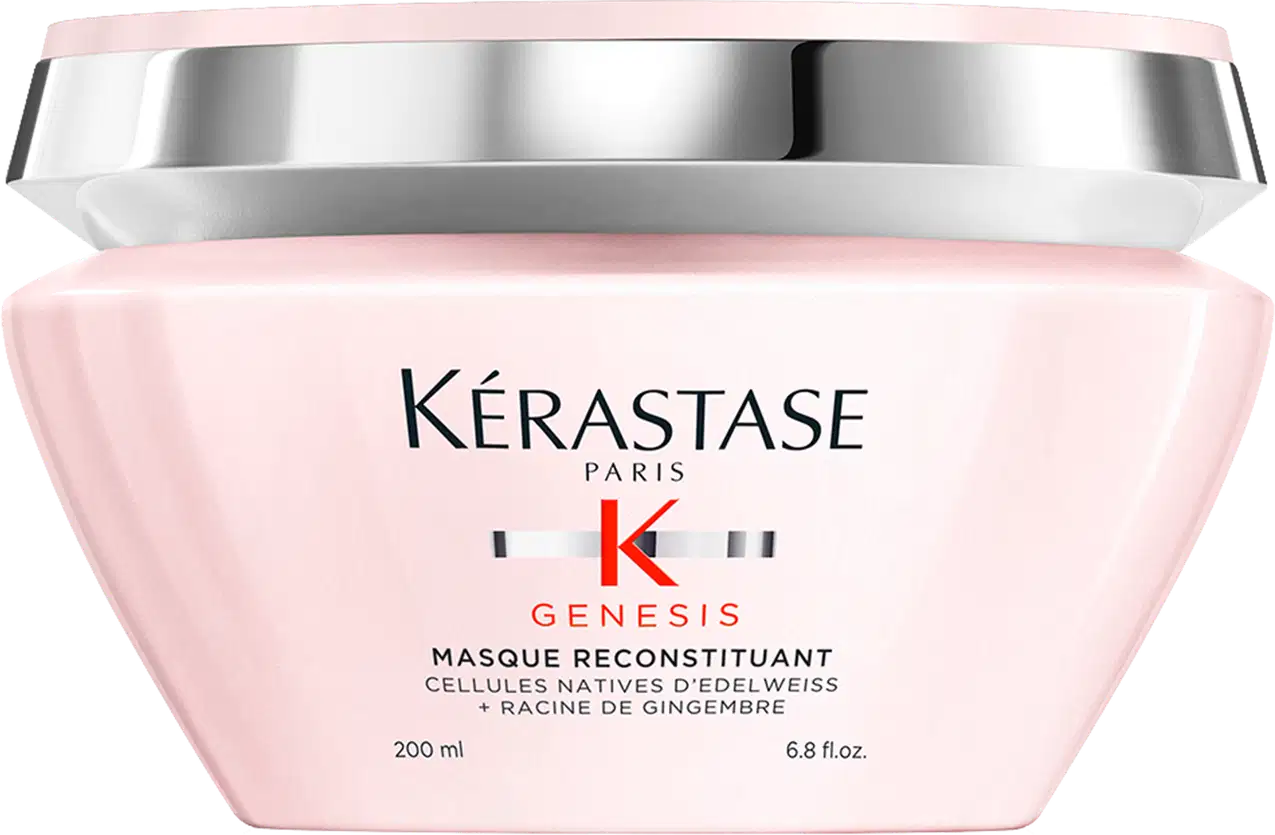 Frasco rosa de 200 ml da máscara Reconstituant Kérastase Genesis, com rótulo destacando os ingredientes ativos de células nativas de edelweiss e raiz de gengibre.