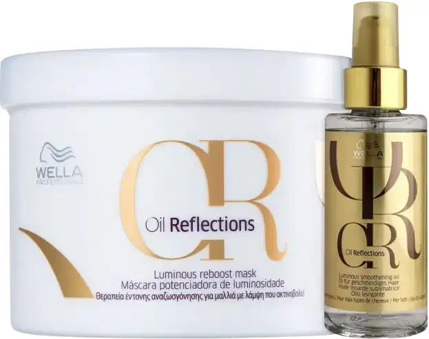Produtos Wella Professionals: máscara potenciadora de luminosidade Oil Reflections em embalagem branca e frasco de óleo capilar Oil Reflections em embalagem dourada.