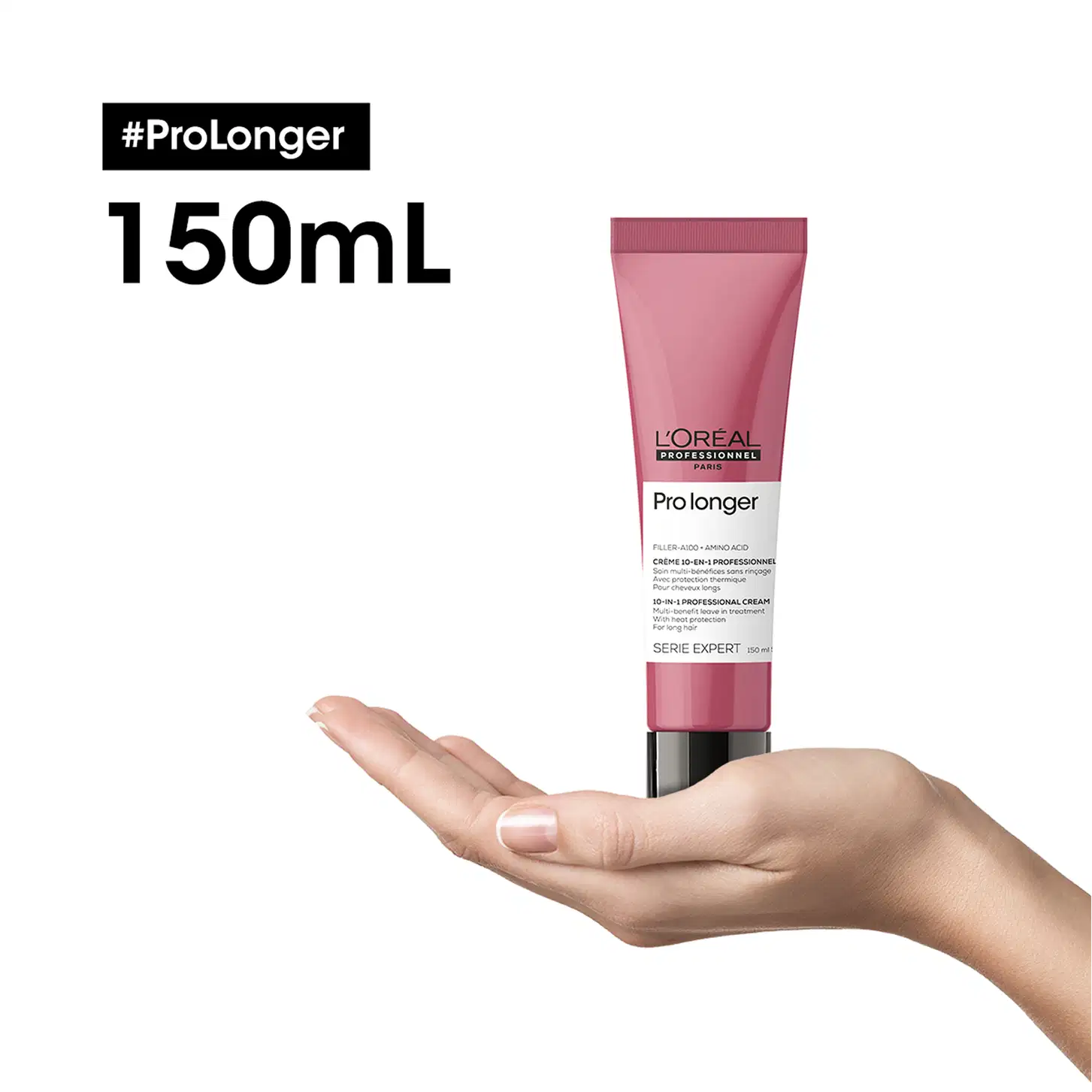 O produto apresentado é um creme de tratamento capilar da linha Pro Longer da L'Oréal Professionnel, em uma embalagem de tubo rosa de 150 mL. O rótulo destaca o nome da linha e a promessa de "maior duração" do tratamento.