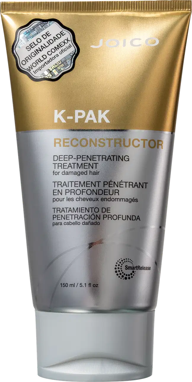 Trata-se de um frasco de tratamento capilar da marca Joico, chamado K-PAK Reconstructor. O produto é apresentado em uma embalagem dourada e prateada, com rótulo destacando suas propriedades de tratamento profundo e penetrante para cabelos danificados.