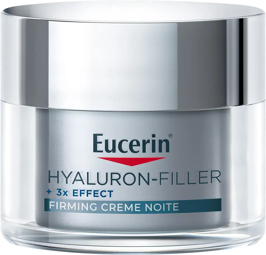 Frasco de creme facial noturno da marca Eucerin, com tampa prateada, rótulo branco e azul, contendo texto "Hyaluron-Filler + 3x Effect Firming Creme Noite".
