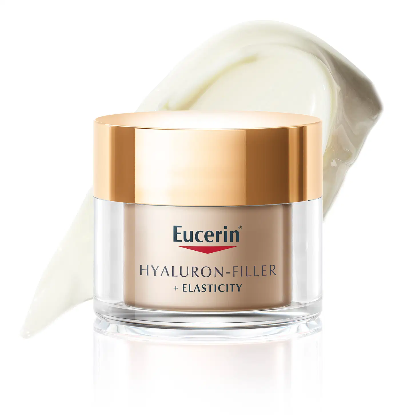 Pote de creme facial da marca Eucerin com textura cremosa e acabamento brilhante, em embalagem de vidro com tampa dourada, sobre superfície clara.