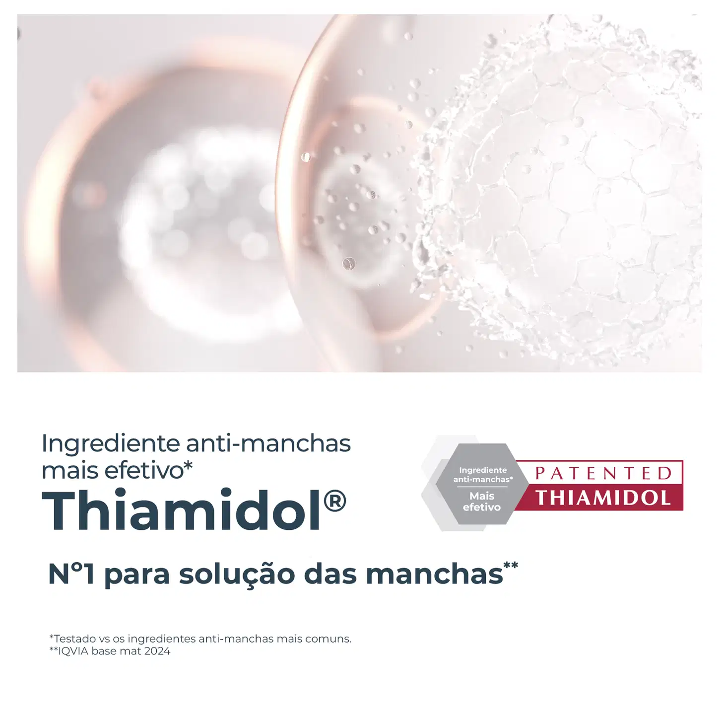 Embalagem de item de perfumaria com ingrediente anti-manchas patenteado Thiamidol, descrito como o número 1 para solução de manchas, com texto "Ingrediente anti-manchas mais efetivo" e "Patented Thiamidol".