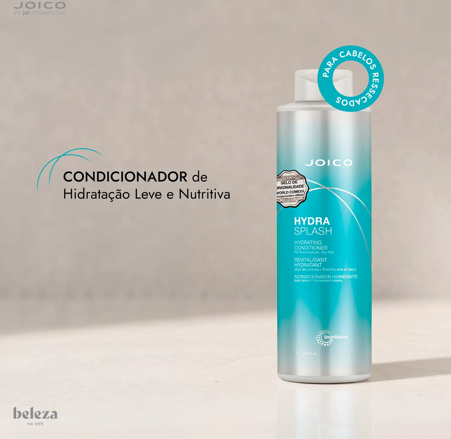 Embalagem branca e azul da marca Joico com texto "Hydra Splash Hydrating Conditioner" e "Revitalisante Hydratant" indicando ser um condicionador hidratante para cabelos.