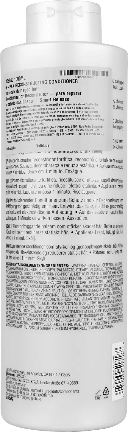 Parte de trás do frasco do condicionador Joico K-PAK To Repair Damage 1c Litro, com rótulo em inglês e espanhol, contendo informações sobre o produto e seus ingredientes.