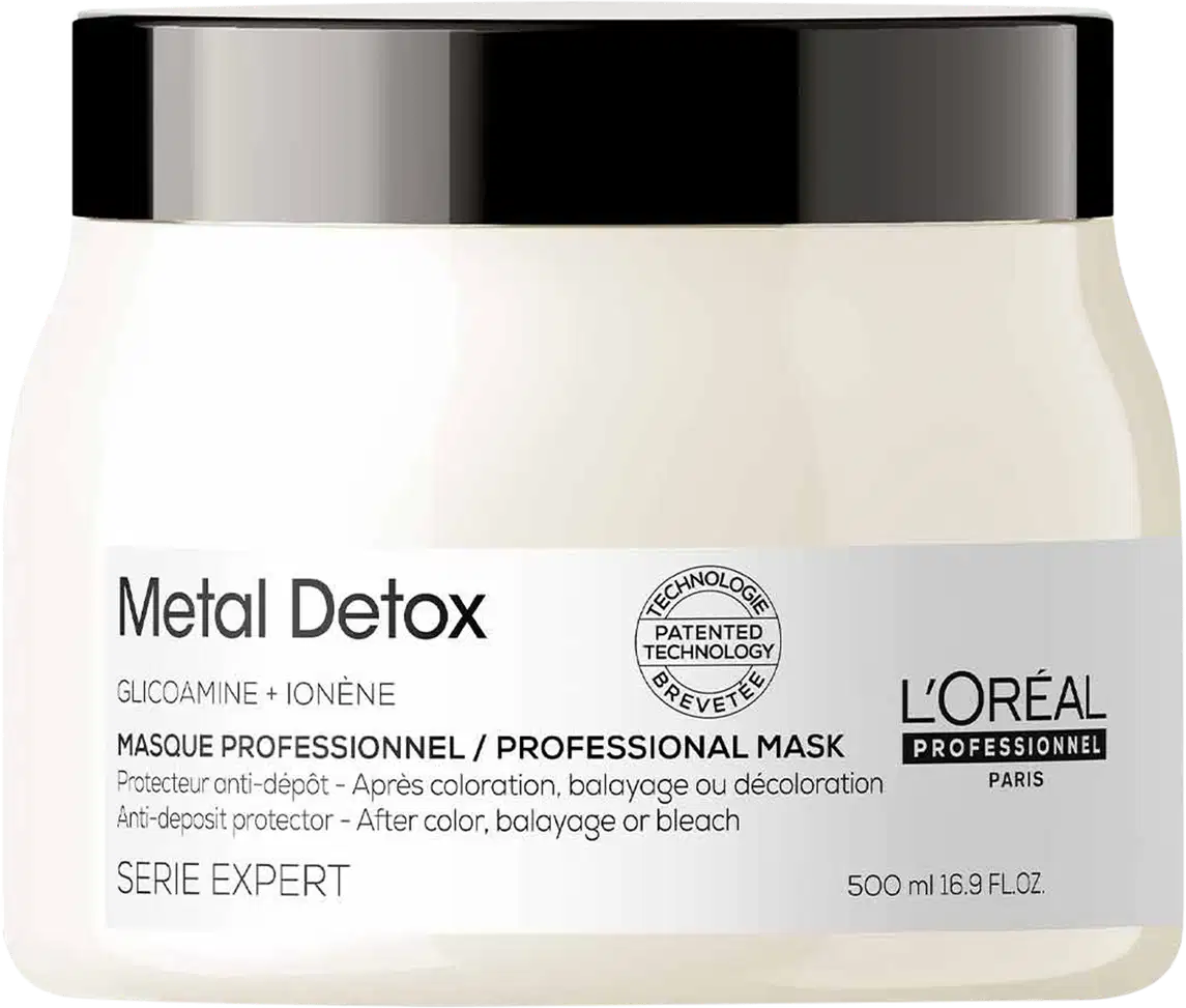 Frasco de máscara profissional L'Oréal Professionnel Metal Detox, com 500 ml, em embalagem branca e preta, com rótulos indicando a tecnologia patenteada e a função de proteção contra depósitos após coloração, descoloração ou descoloração.
