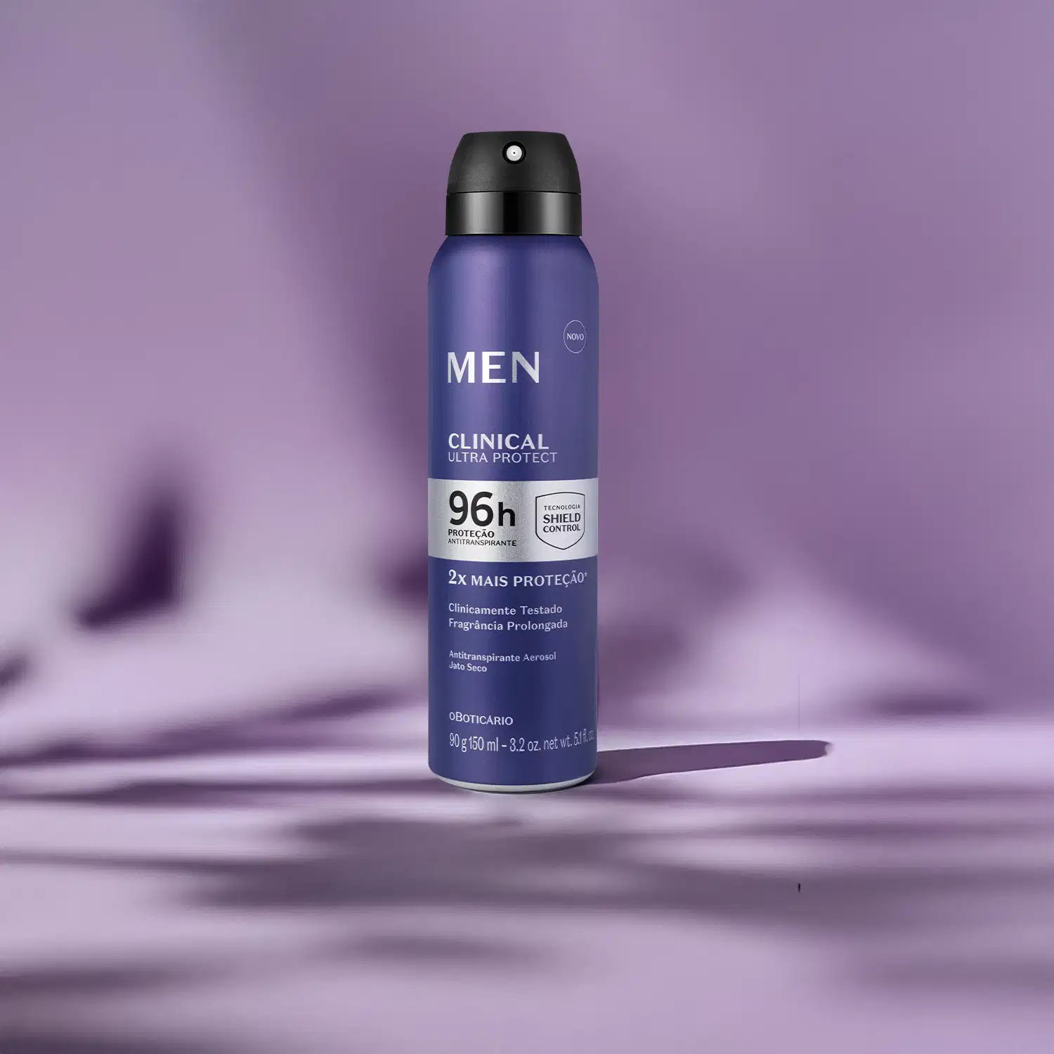 Imagem de frasco de desodorante aerossol masculino da marca Men, em tom azul, com texto "Clinical Ultra Protect" e informações sobre proteção por 96h, em fundo roxo com sombras.