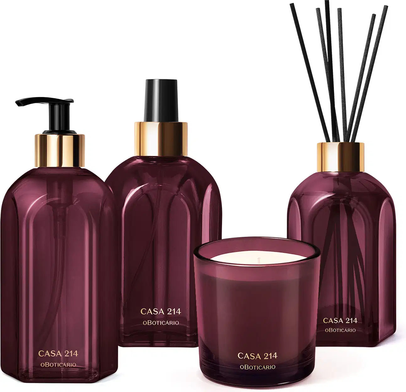 A imagem mostra um kit com quatro itens da linha Casa 214 Figo Magnífico: sabonete líquido, aromatizador de ambiente, vela perfumada e difusor de ambiente. Todos eles são em vidro roxo com detalhes em dourado e preto. Acompanha varetas de madeira.