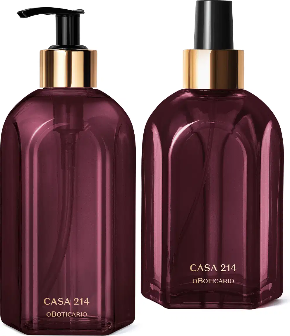 A imagem mostra dois itens da marca Casa 214 Figo Magnífico:  são dois vidros na cor roxa com detalhes em dourado, um de sabonete líquido com bomba dosadora preta e outro de aromatizador de ambientes com válvula spray também preta.