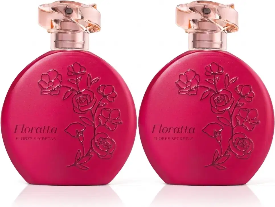 Dois frascos de item de perfumaria da marca Floratta Flores Secretas em formato redondo, cor rosa vibrante opaco com detalhes em relevo com flores estilizadas e tampa em acrílico rosado transparente e borrifador dourado posicionados lado a lado.
