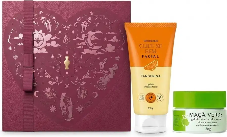 Caixa de presente de cor vinho com um grande coração contendo ilustrações em relevo de temática celestial. Ao lado, uma bisnaga laranja da linha Cuide-se bem Tangerina e um pote de hidratante branco com tampa verde com fragrância de Maçã Verde.