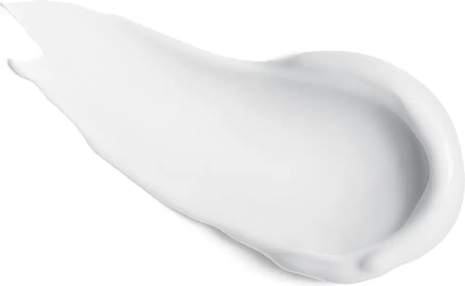 Textura branca, cremosa e brilhante de um produto de cuidados com a pele em uma superfície branca e lisa.