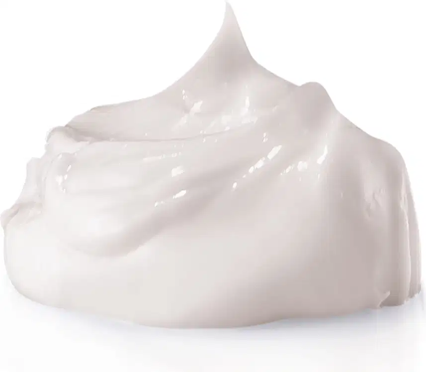 Textura cremosa e brilhante de loção hidratante corporal Cuide-se Bem Boa Noite com superfície aveludada e aparência suave, em um fundo branco.