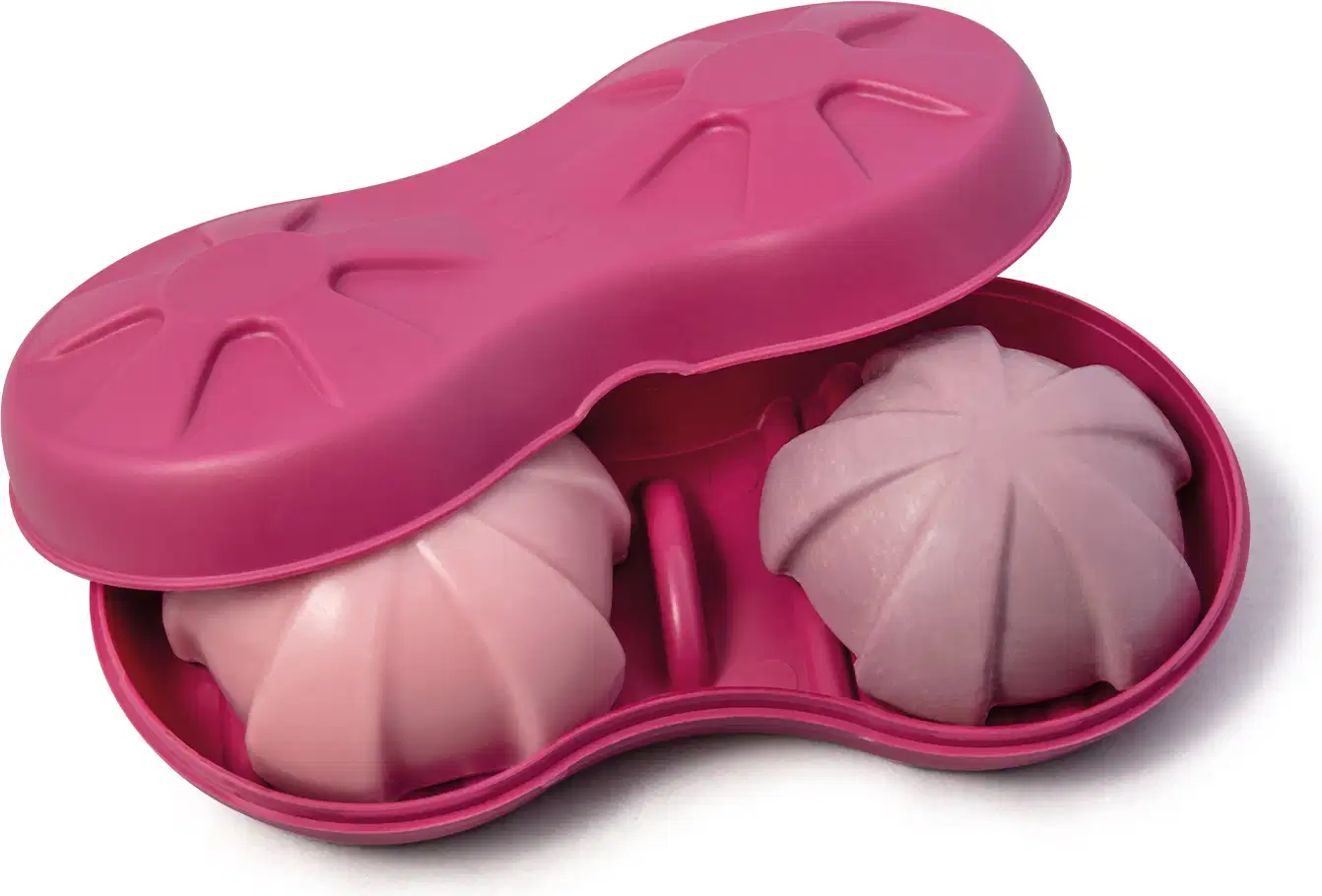 Base para sólidos na cor rosa da marca Nativa SPA, ideal para produtos em barra. O produto tem duas partes arredondadas para acomodar os itens. Dentro dele, é possível ver dois itens em barra, um na cor rosa e outro na cor roxa.