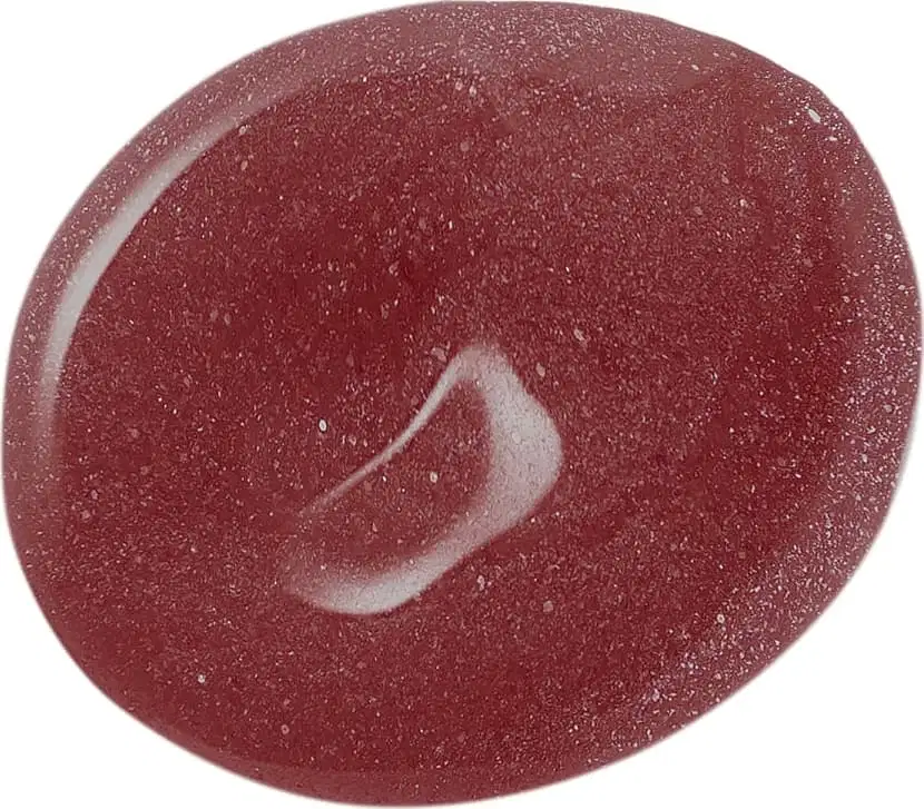 Textura gelatinosa e de cor marrom do gloss labial na cor Marrom Nude 115 da marca Intense, com aparência brilhante e de alta pigmentação, espelhada sobre superfície branca.