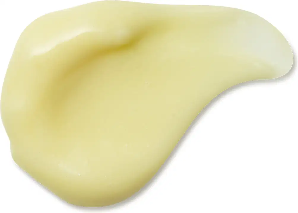 Imagem da textura cremosa e brilhante de loção hidratante corporal Cuide-se Bem Banana em tons de amarelo claro, com superfície lisa e uniforme.
