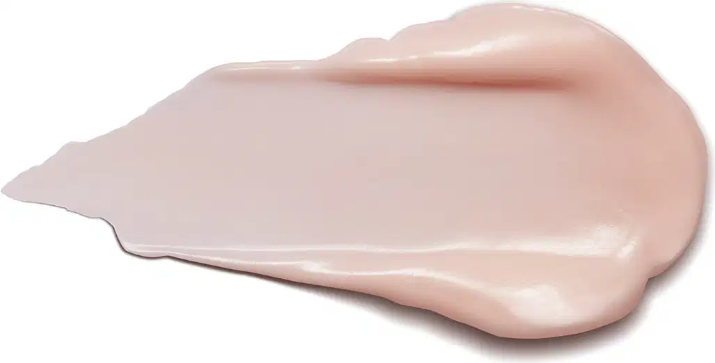 Textura cremosa e brilhante de creme nutritivo firmador Botik Resveratrol e Silício, com aparência suave e uniforme em superfície clara.