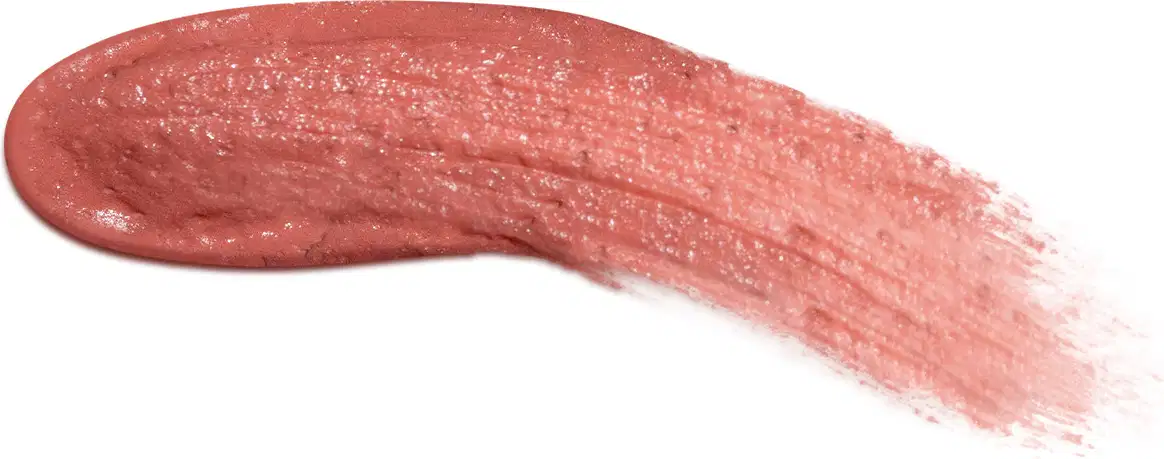 Textura cremosa e brilhante de batom líquido rosa French Rose da marca Make B. One Velvet Sublime, com superfície irregular e aspecto úmido, ocupando a maior parte da imagem em fundo branco.