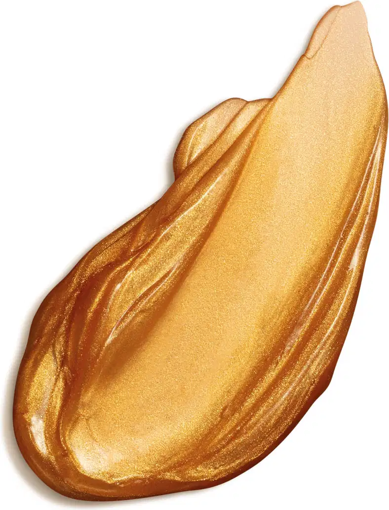 Textura dourada brilhante e viscosa de geleia iluminadora hidratante corporal da marca Lily, com superfície irregular e ondulada, ocupando grande parte da imagem em fundo branco.